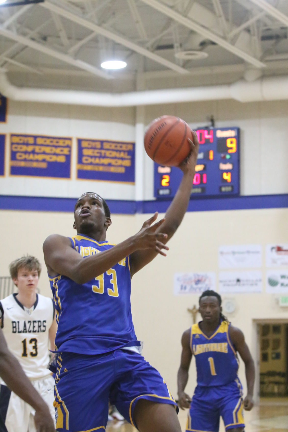 Gallery: Lighthouse at Marquette Catholic boys basketball